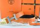 Hermes Reversible Belt Orange/Black Ostrich Stripe Leather With 18K Silver Spot Stripe H Buckle
